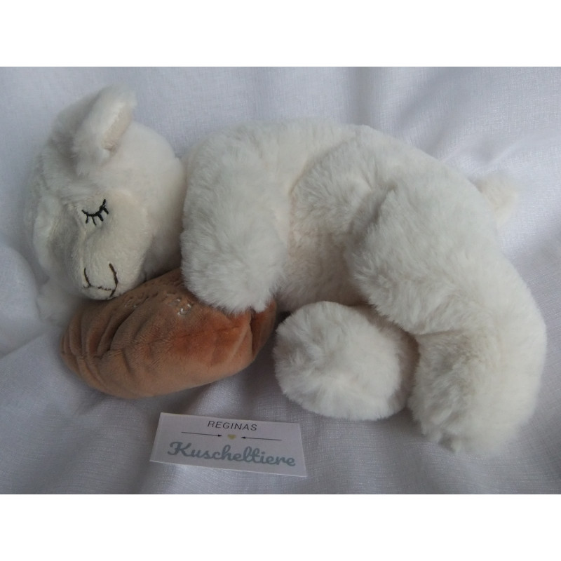 Inware - Plüschtier - schlafendes Schäfchen/Schaf mit kleinem Kissen - ca. 25 cm lang - liegend