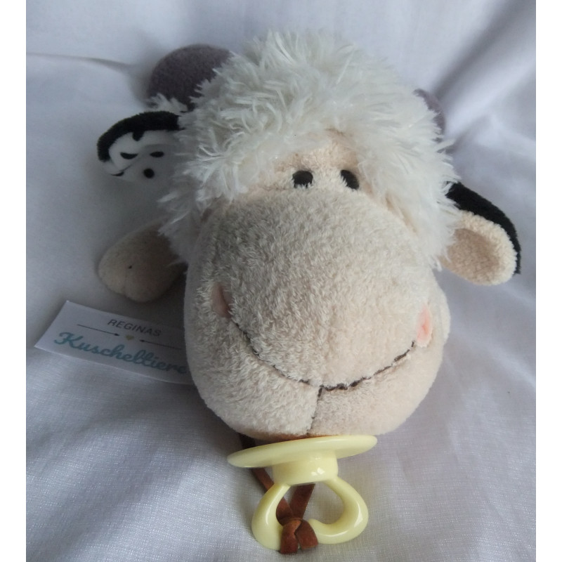 Nici - Plüschtier - Schaf Jolly Mäh Netty mit Schnuller das Schnullerband ist kein Original Nici - ca. 35 cm groß - liegend