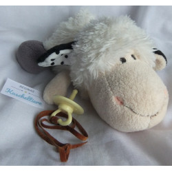 Nici - Plüschtier - Schaf Jolly Mäh Netty mit Schnuller das Schnullerband ist kein Original Nici - ca. 35 cm groß - liegend