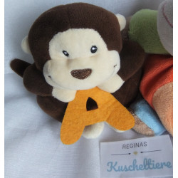 Zwei Plüschtiere - Kik Okay Spieltier Affe bunt  und Hachette ABC Tier Affe braun, beige