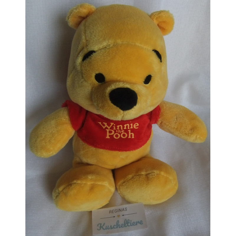 Nicotoy - Disney - Plüschtier - Winnie Pooh gelb mit Pullover rot mit Aufschrift - ca. 30 cm groß - Schlenker
