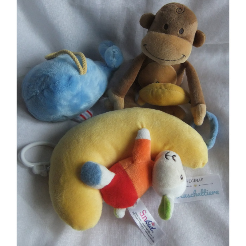 drei Spieluhren - Tchibo TCM Spieluhr Wal - Sunkid Schaf im Mond Spieluhr - Babylove Affe mit Banane