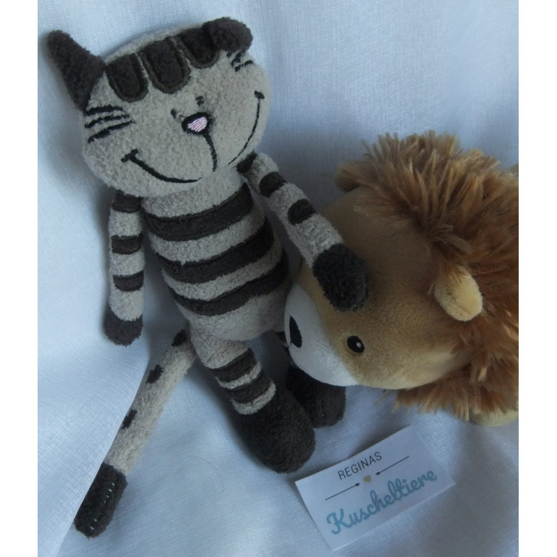 Zwei Plüschtiere - Inware GmbH Plüschtier Katze und H&M Löwe