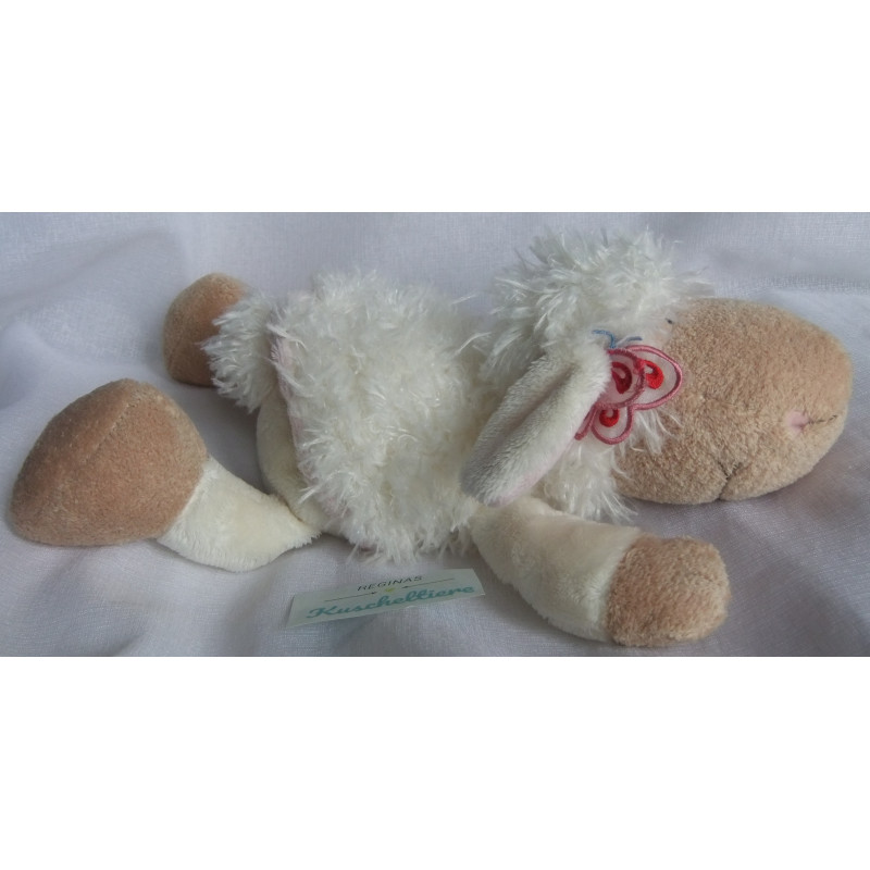 Nici - Plüschtier - Schaf Jolly Mäh Elsa mit Schmetterling am Öhrchen - ca. 30 cm groß - liegend